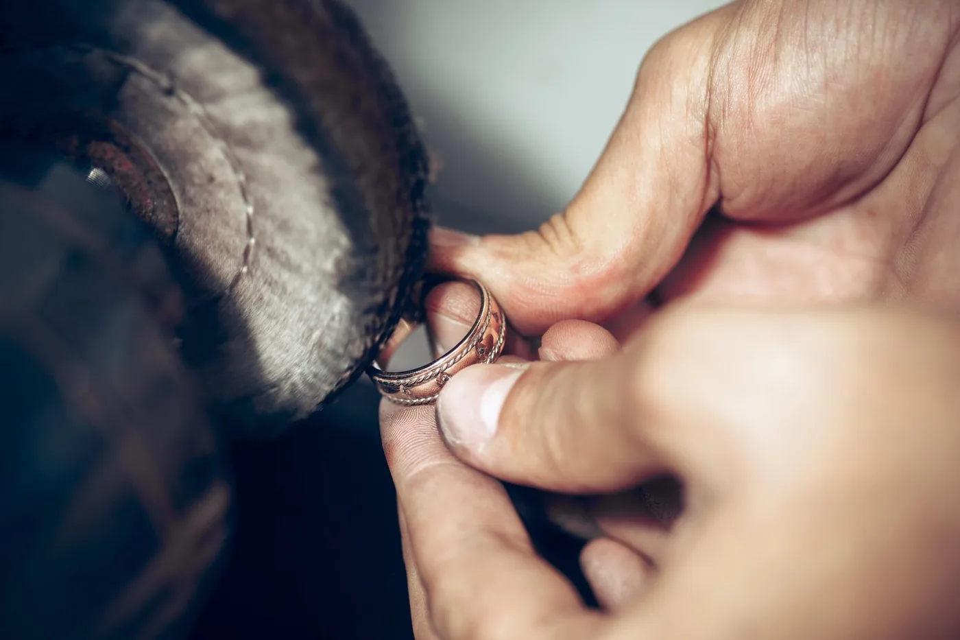 Polishing jewellery to a high lustre.